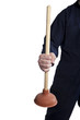 close up of plummer holding a plunger to unclog the toilet