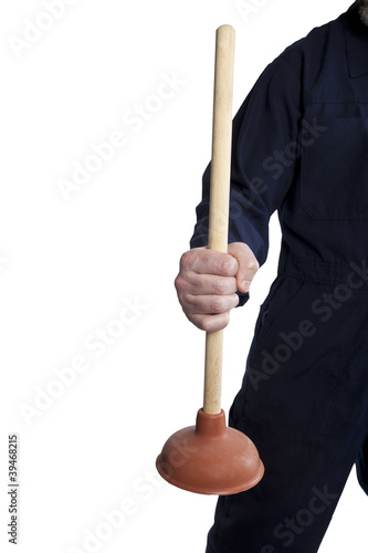 Photo: close up of plummer holding a plunger to unclog the toilet close up of plummer holding a plunger to unclog the toilet