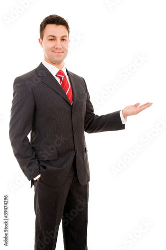 Photo: Happy business man presenting, isolated on white background Happy business man presenting, isolated on white background