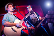 Foto: musician plays a guitar musician plays a guitar