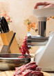 Processing minced meat in meat grinder
