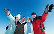 group of happy young people in winter