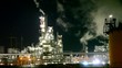 Petrochemical plant at night - smokestack