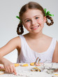 Happy Easter - lovely girl making easter cookies