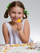 Happy Easter - lovely girl making easter cookies