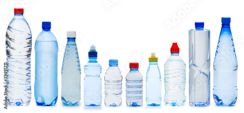 Photo: Many water bottles isolated on white Many water bottles isolated on white