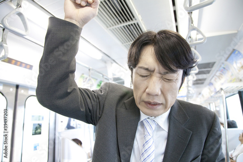 Photo: 体調の悪いビジネスマン 体調の悪いビジネスマン