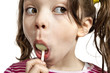 Girl with a lollipop, isolated on white background