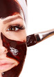 Photo: Girl having chocolate facial mask. Girl having chocolate facial mask.