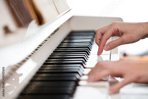 Photo: Playing Piano (shallow DOF; color toned image) Playing Piano (shallow DOF; color toned image)