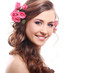 Photo: Beautiful woman with roses in hair Beautiful woman with roses in hair