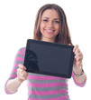 Happy brunette woman holding in hand a tablet touch pad computer