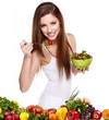 Photo: Woman with salad isolated on white Woman with salad isolated on white