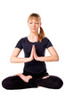 Photo: Young woman in the lotus pose Young woman in the lotus pose