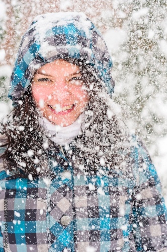 Photo: Out of focus picture of a woman with a lot of snowflakes Out of focus picture of a woman with a lot of snowflakes