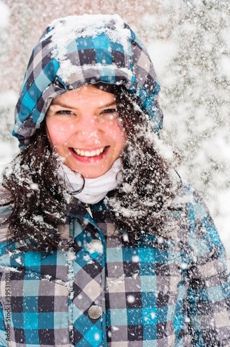 Photo: Out of focus picture of a woman with a lot of snowflakes Out of focus picture of a woman with a lot of snowflakes