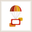 Warm colored flying parachute with frame.