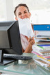 Portrait of a businesswoman with too much work going crazy