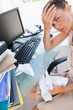 Businesswoman overwhelmed by work 