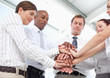 Business team doing a team building exercise for motivation