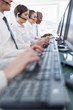 Business team working hard on computers,