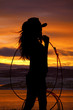 Foto: cowgirl holding rope cowgirl holding rope