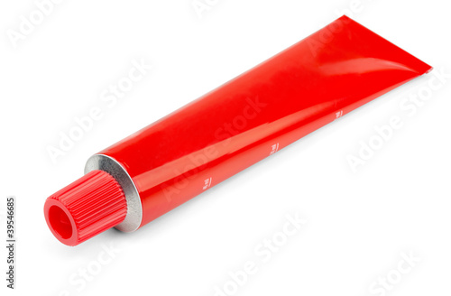 Photo: Red tube of ointment isolated on white Red tube of ointment isolated on white