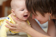 Happy baby boy with his mother