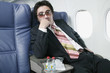 Portrait of businessman with drinks