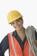 Portrait of female construction worker smiling