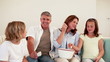 Happy family watching a movie