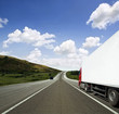 Photo: red trailer on the highway red trailer on the highway