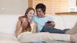 Video: A couple watching television together A couple watching television together