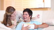 Woman giving a gift to her husband