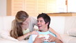 Wife giving a gift to her husband