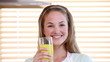 Video: Smiling woman drinking orange juice Smiling woman drinking orange juice