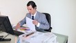 Businessman working on graphs