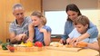 Happy family cooking together