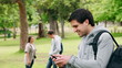 Video: Man laughing as he reads a text message before looking at the camera while smiling Man laughing as he reads a text message before looking at the camera while smiling