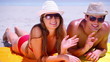Smiling couple waving their hands