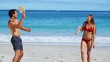 Cheerful couple playing with paddles