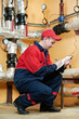 heating engineer repairman in boiler room
