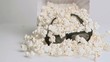 Popcorn falling in super slow motion with 3D glasses