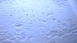 Rain falling in super slow motion on the floor