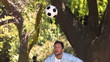 Man in slow motion playing soccer