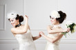 Two sisters brides having fun