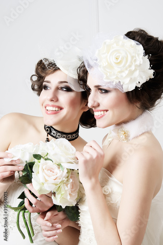 Photo: Two sisters brides having fun Two sisters brides having fun