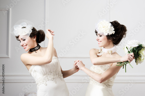 Photo: Two sisters brides having fun Two sisters brides having fun