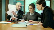 Young people at business meeting in the office, steadicam shot