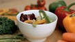 Pepper slices falling into bowl in super slow motion